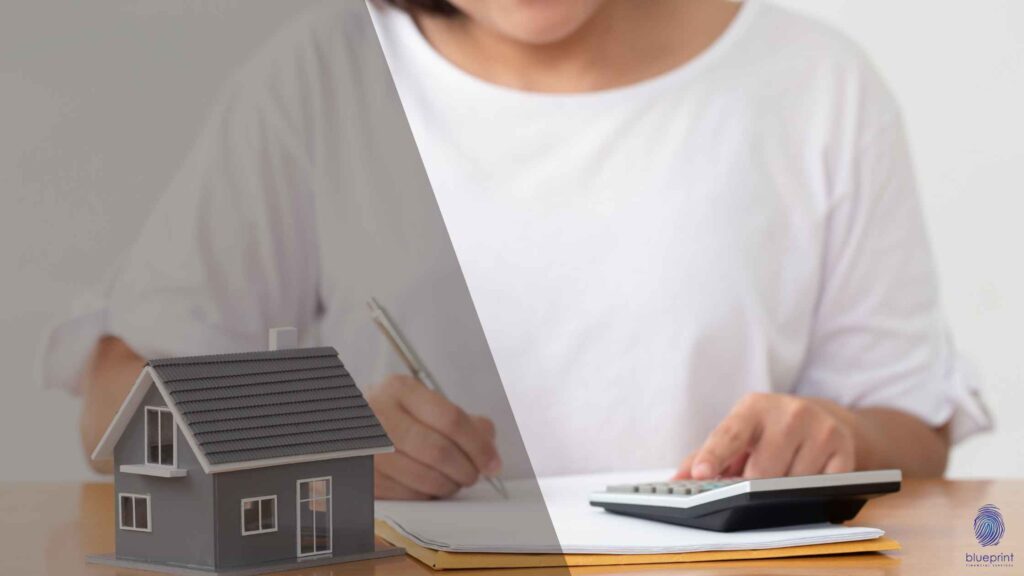 Person calculating finances on a calculator: how does refinancing work?